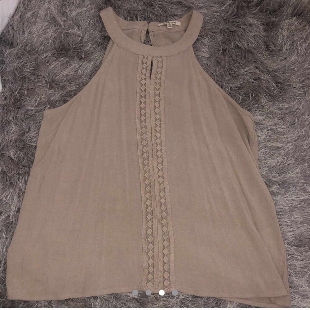Beige color tank top shirt